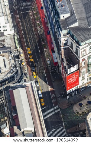 New York City - June 23: High angle view from Empire State Building into the streets of Manhattan with the large Macy\'s store, USA on June 23, 2013