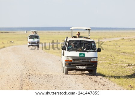 Amboseli, Kenya - February 4: Safari Cars with tourists in Amboseli National Park in Kenya on February 4, 2013
