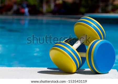 Two plastic dumbbells for water aerobics