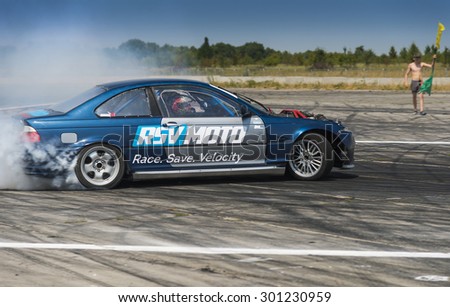 Vinnytsia,Ukraine-July 24, 2015: Unknown rider  on the car brand BMW overcomes the track in the  Drift championship of Ukraine  on July 24,2015 in Vinnytsia, Ukraine.