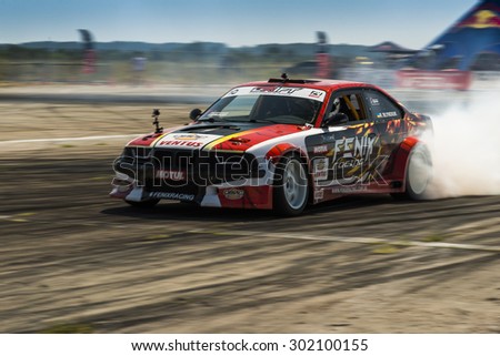 Vinnytsia,Ukraine-July 25, 2015: Unknown rider  on the car brand BMW overcomes the track in the  Drift championship of Ukraine  on July 25,2015 in Vinnytsia, Ukraine.