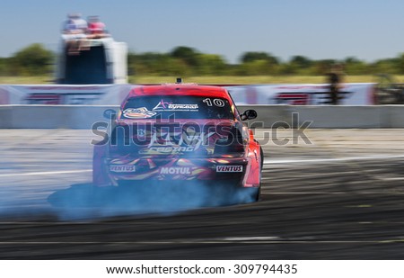 Vinnytsia,Ukraine-July 25, 2015: Unknown rider  on the car brand BMW overcomes the track in the  Drift championship of Ukraine  on July 24,2015 in Vinnytsia, Ukraine.
