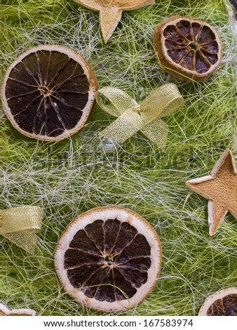 Original Christmas decorations - rings and stars - cut from dried orange peel.