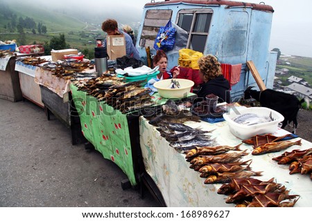 Lake Baikal, Russia - August 03, 2006: Roadside stalls with smoked fish including the amous Baikal omul near lake Baikal on August 03, 2006.