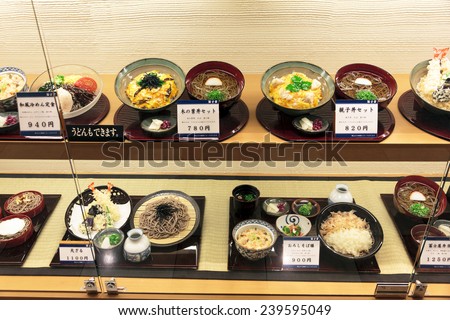 Kyoto, Japan - June 24, 2010: Plastic models of various dishes in a restaurant window on  June 24, 2010. Most street bars and restaurants in Japan exhibit their menu in the form of plastic models.