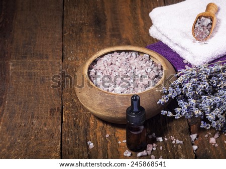Spa background with bunch of lavender and purple sea salt. Copy space.
