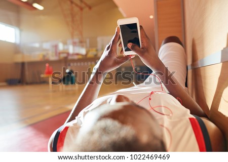 Similar – Image, Stock Photo Sportsman listening to music during workout