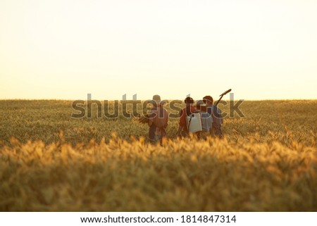 Similar – Image, Stock Photo Crop person with a bunch of fresh asparagus