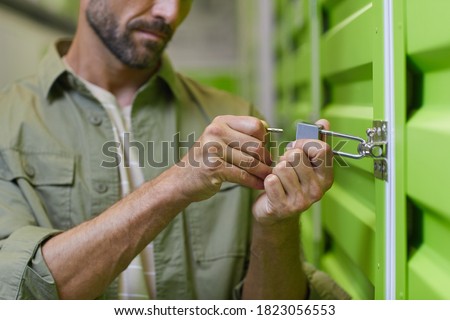 Similar – Image, Stock Photo opened warehouse door with unexpected noble blue curtain