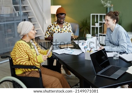 Similar – Image, Stock Photo Disabled young woman in kitchen with cat on her lap