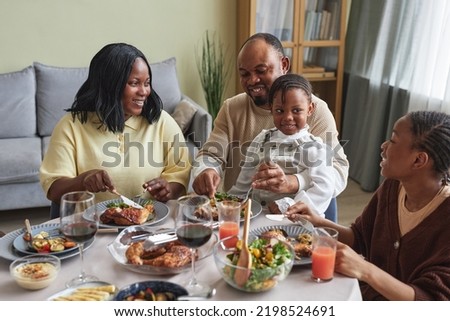 Similar – Image, Stock Photo African American woman eating strawberry
