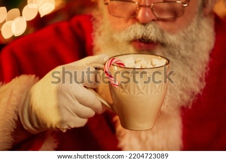 Similar – Image, Stock Photo Chocolate Santa Claus looks out of a white paper bag with starlight