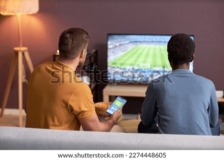 Similar – Image, Stock Photo Black friends sitting back to back in city