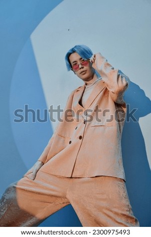 Similar – Image, Stock Photo Young man in stylish clothes standing near weathered building