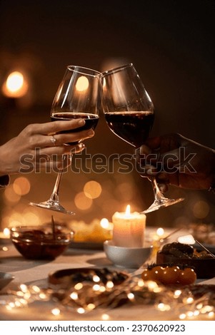 Similar – Image, Stock Photo Candlelight. Candle glasses with burning tea lights