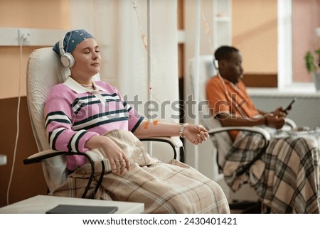 Similar – Image, Stock Photo Young woman listening to music