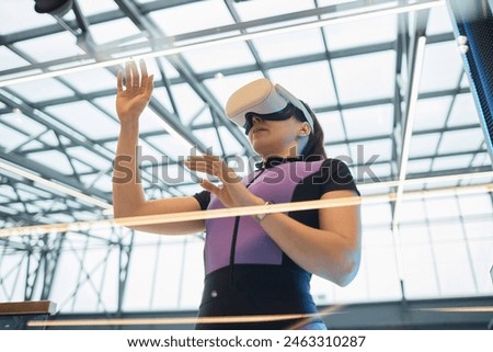 Similar – Image, Stock Photo Sportswoman in headset using social media on smartphone after workout