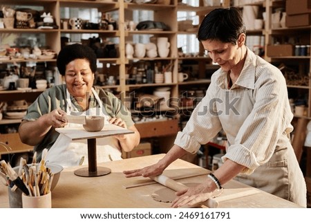 Similar – Image, Stock Photo Portrait of woman pottery artist in art studio