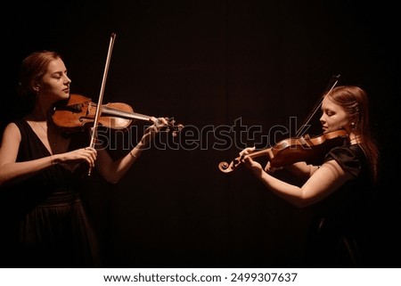 Similar – Foto Bild Eine Geigerin spielt klassische Musik in einem Saal