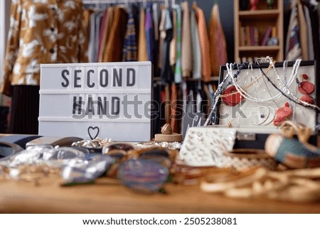 Similar – Image, Stock Photo Store, inscription on the window of a store. In the background passers-by in a pedestrian zone