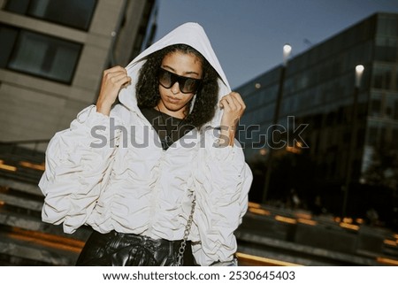 Similar – Image, Stock Photo Trendy businesswoman and sunglasses leaning behind bus