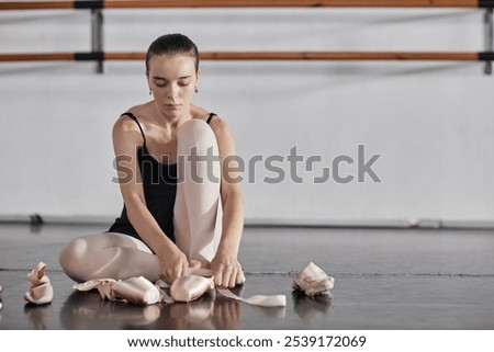 Similar – Image, Stock Photo A teenage girl ties her shoelaces in sneakers, prepares for training