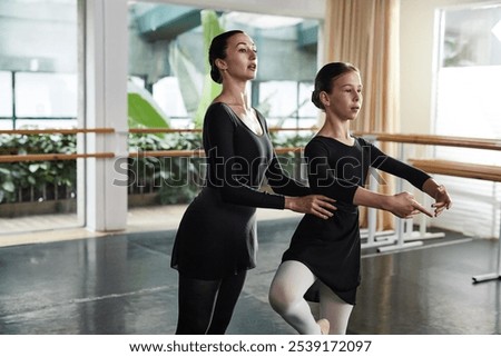 Similar – Image, Stock Photo Little concentrated girl with hairbuns is planting a flower in a flowerpot. Spring indoor activity. Caucasian ethnicity. Front view. Vertical shot. Selective focus