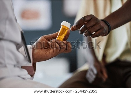 Similar – Image, Stock Photo Unrecognizable male doctor giving anesthesia to patient lying on couch before surgery