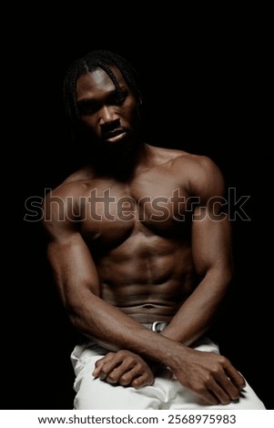 Similar – Image, Stock Photo Emotionless shirtless black guy on pink background