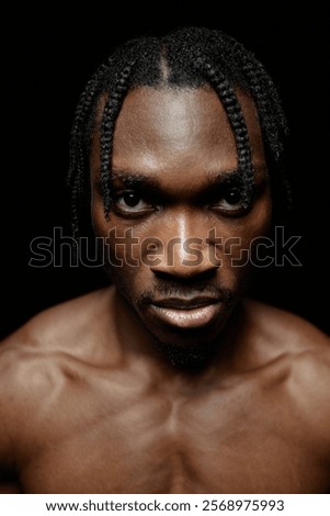 Similar – Image, Stock Photo Emotionless shirtless black guy on pink background