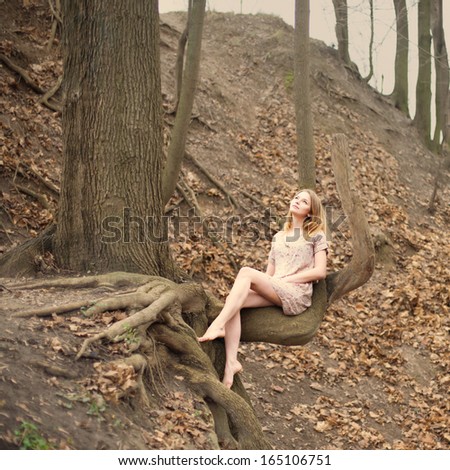 Portrait of romantic girl in fairy forest