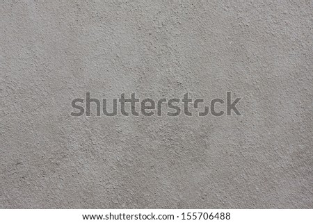 grey sprayed coating on a wall