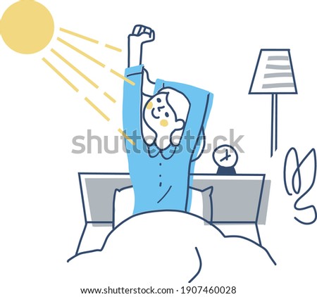 A woman stretching in bed while bathing in the morning sun