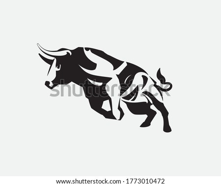 A bull is running with full of energy. Big bull rears before running. Big buffalo symbol. Bull vector icon isolated on white background. Wild bull brand logo, mascot, icon. Torro brand logo template. 