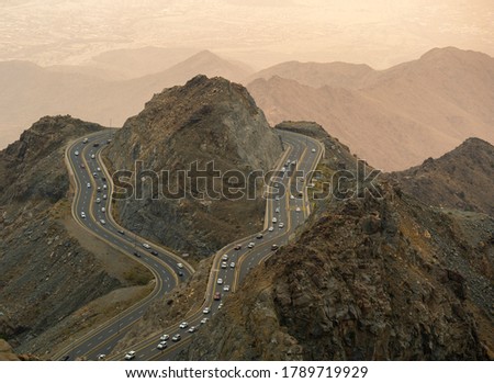 Traffic travelling around mountain pass on the zig zag road in Al Hada, Taif region of Saudi Arabia