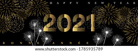 New Year's greetings 2021 - Night party mood banner with fireworks and sparklers - French, English text, translation: Happy New Year.