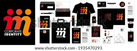 Orange M logo, made up of 3 stylized characters and a range of objects, bag, T-shirt, notebook, card, etc., to give your company an identity. 