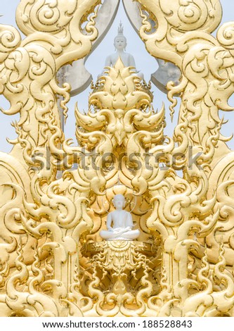 budda statue with gold frame, white temple, Thailand
