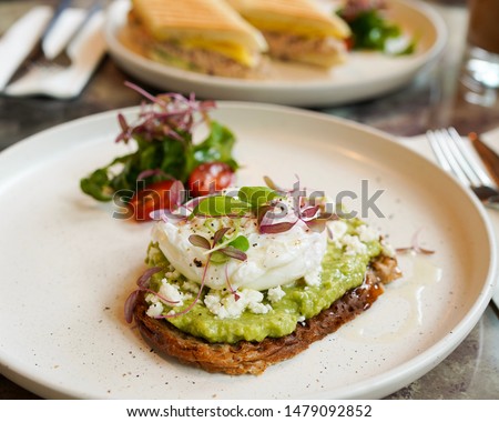 Similar – Image, Stock Photo Delicious avocado and ricotta toast served on plate