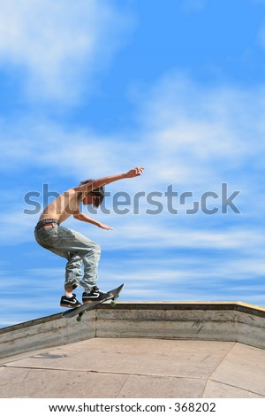 Teen Boy Shirtless In Jeans Skateboarding At Outdoor Skatepark. Stock ...