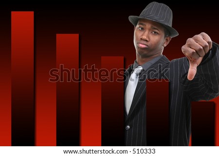 Businessman With Thumb Down Over Falling Graph Background.  Red and black graph.