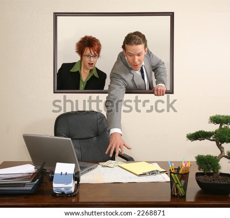 Business team in portrait on wall stealing money from desk.  USD.