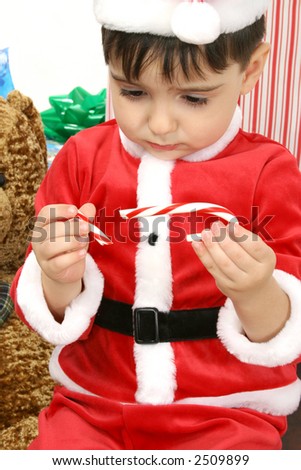 stock-photo-sad-boy-in-christmas-suit-wi