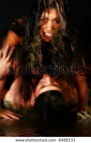 Beautiful Filipino woman and Caucasian man covered in mud.