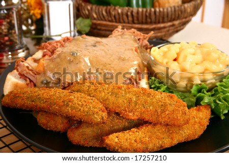 Fried pickles with open roast beef sandwich and macaroni and cheese.