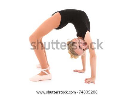 Happy eight year old caucasian girl in ballerina uniform doing bridge up, back bend over white with clipping path.