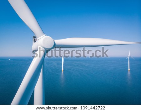 Wind turbine from aerial view, Drone view at windpark westermeerdijk a windmill farm in the lake IJsselmeer the biggest in the Netherlands,Sustainable development, renewable energy Foto d'archivio © 