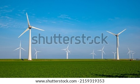 Image, Stock Photo huge wind turbine from frog perspective in front of blue sky