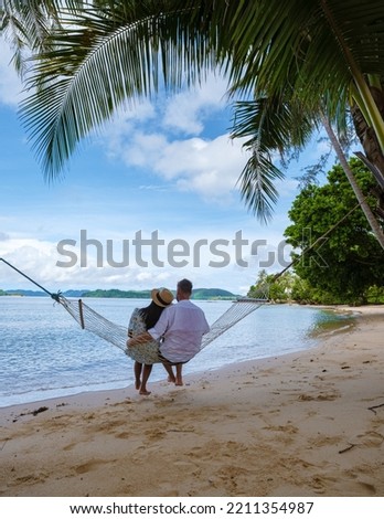 Similar – Image, Stock Photo Relaxing on the hammock. Baby wagtail (Motacilla alba) young bird in the garden, in the sunlight