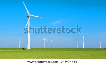 Similar – Image, Stock Photo View on several windmills, wind generators, turbines, producing renewable clean energy by converting kinetic energy